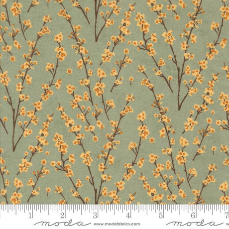 a repeating pattern of small orange flowers on brown branches against a light green background.