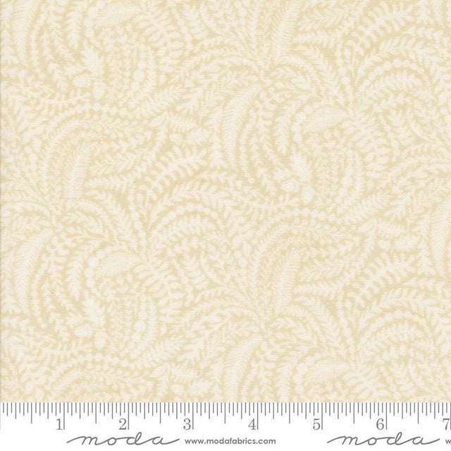 The image is a fabric with a repeating pattern of leaves or ferns in various shades of beige.