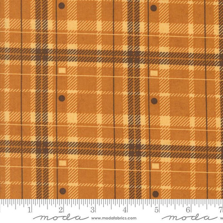 a close-up view of a fabric with a plaid pattern in shades of brown and orange. The fabric appears to be made of a material with a grid-like texture, which is commonly associated with plaid patterns. The image does not contain any text or other discernible objects or actions.