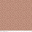 a repeating pattern of small white dots on a brown background.