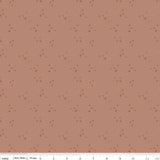 The image is a repeating pattern of small brown stars on a light pink background.