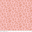 a repeating pattern of small orange flowers and leaves on a pink background.