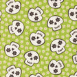 a repeating pattern of stylized skull faces on a green background with white flowers.