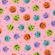 a repeating pattern of Halloween pumpkins and stars on a pink background.