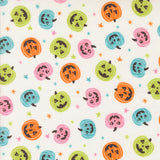 a repeating pattern of Halloween pumpkins in various colors and sizes, along with small stars scattered throughout the design.