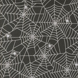 a repeating pattern of white spider web designs on a dark background.
