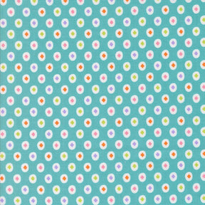 a pattern of small white and colorful circles on a light blue background.
