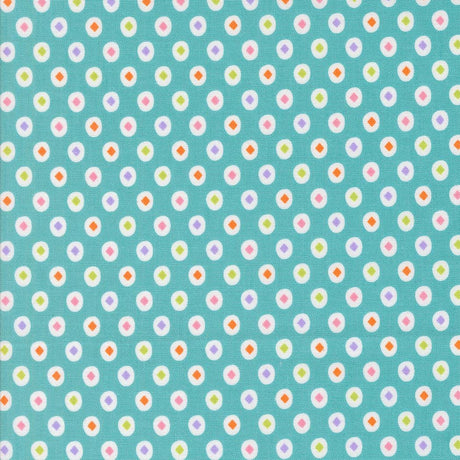 a pattern of small white and colorful circles on a light blue background.