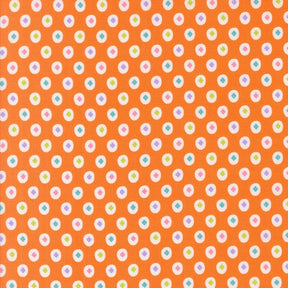 a repeating pattern of small white and orange circles on an orange background.