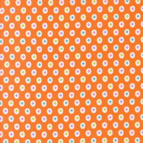 a repeating pattern of small white and orange circles on an orange background.