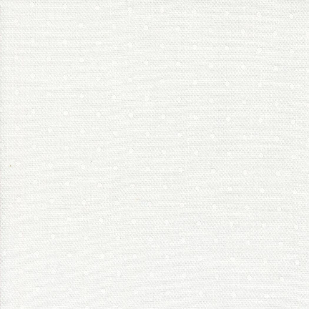 a white background with white polka dots