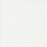 a white background with white polka dots