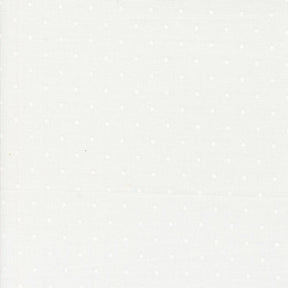 a white background with white polka dots