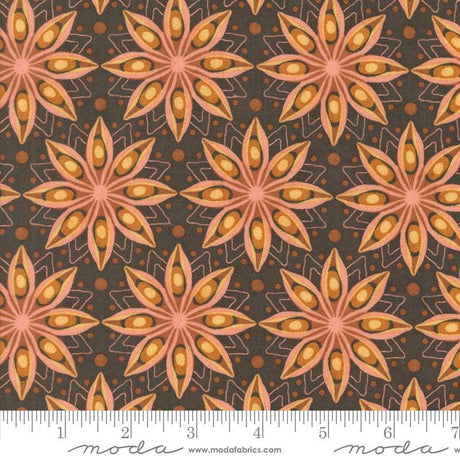 a repeating pattern of large, stylized orange and brown flowers against a dark background.