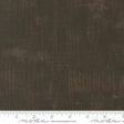 The image is a close-up of a textured fabric with a dark brown or black color.