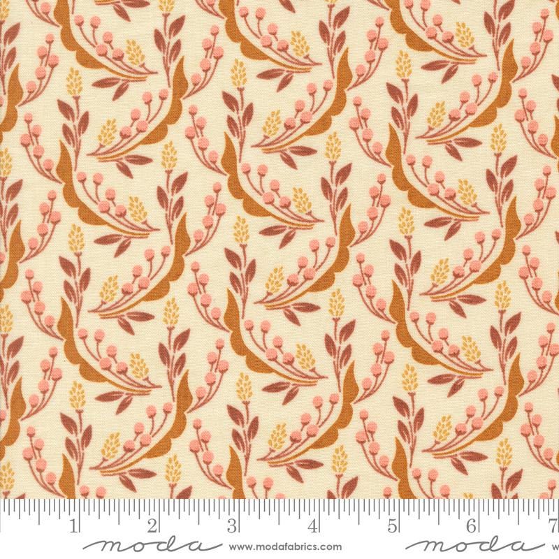 a repeating pattern of leaves and flowers in shades of orange and brown on a cream-colored background.