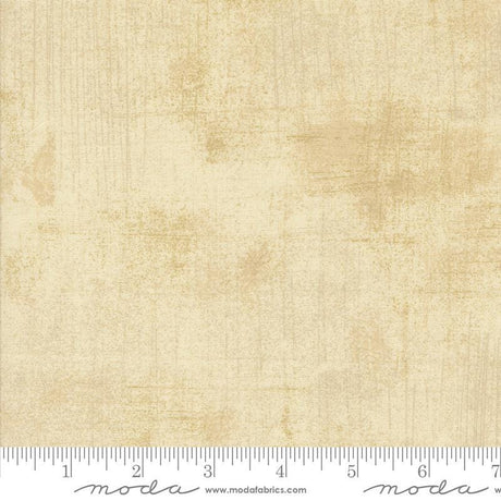 The image is a plain beige fabric with a textured appearance.
