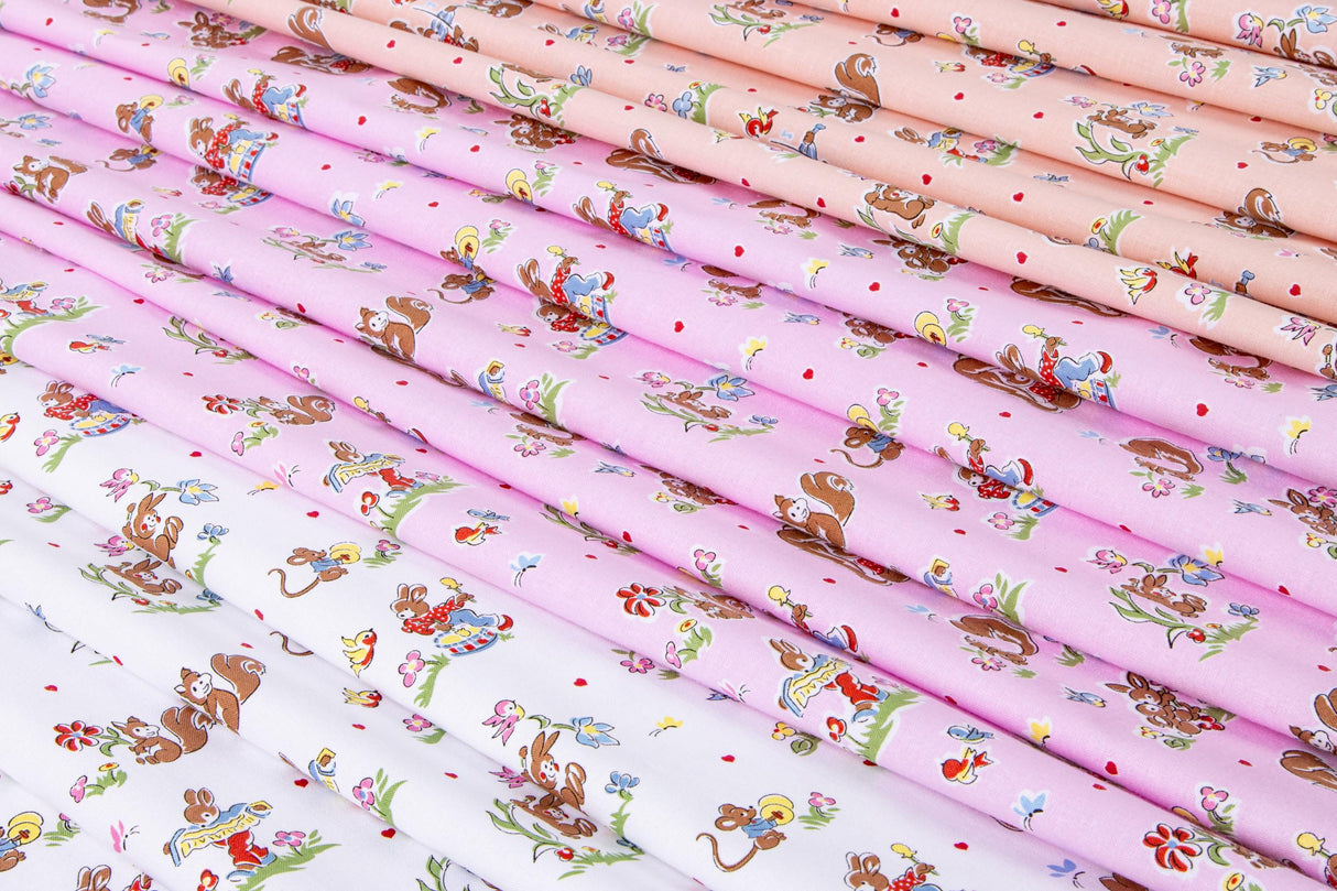 a collection of fabric swatches with various patterns and designs, including animals, flowers, and other decorative elements.