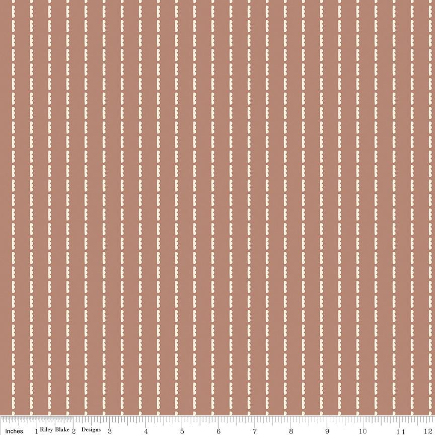 a repeating pattern of brown and white vertical stripes.