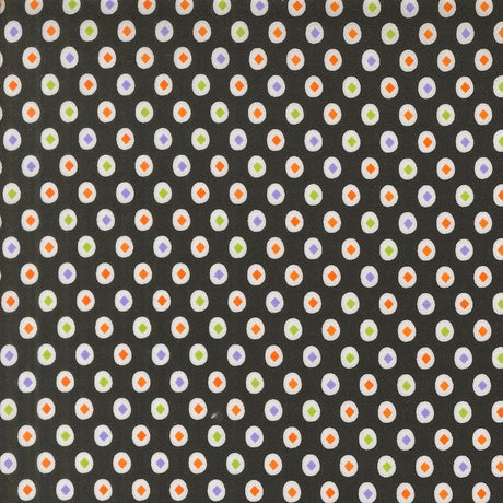 a repeating pattern of small white and orange circles on a dark background.
