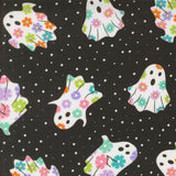 a pattern of colorful ghost-like figures against a dark background with white polka dots.
