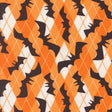a repeating pattern of black bat silhouettes against an orange and white diamond-shaped background.