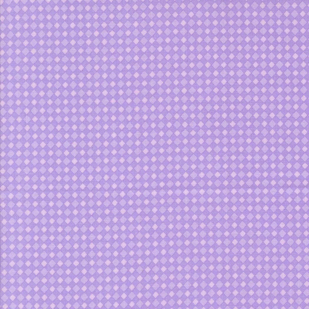 The image is a purple background with a repeating pattern of small white squares or diamonds.