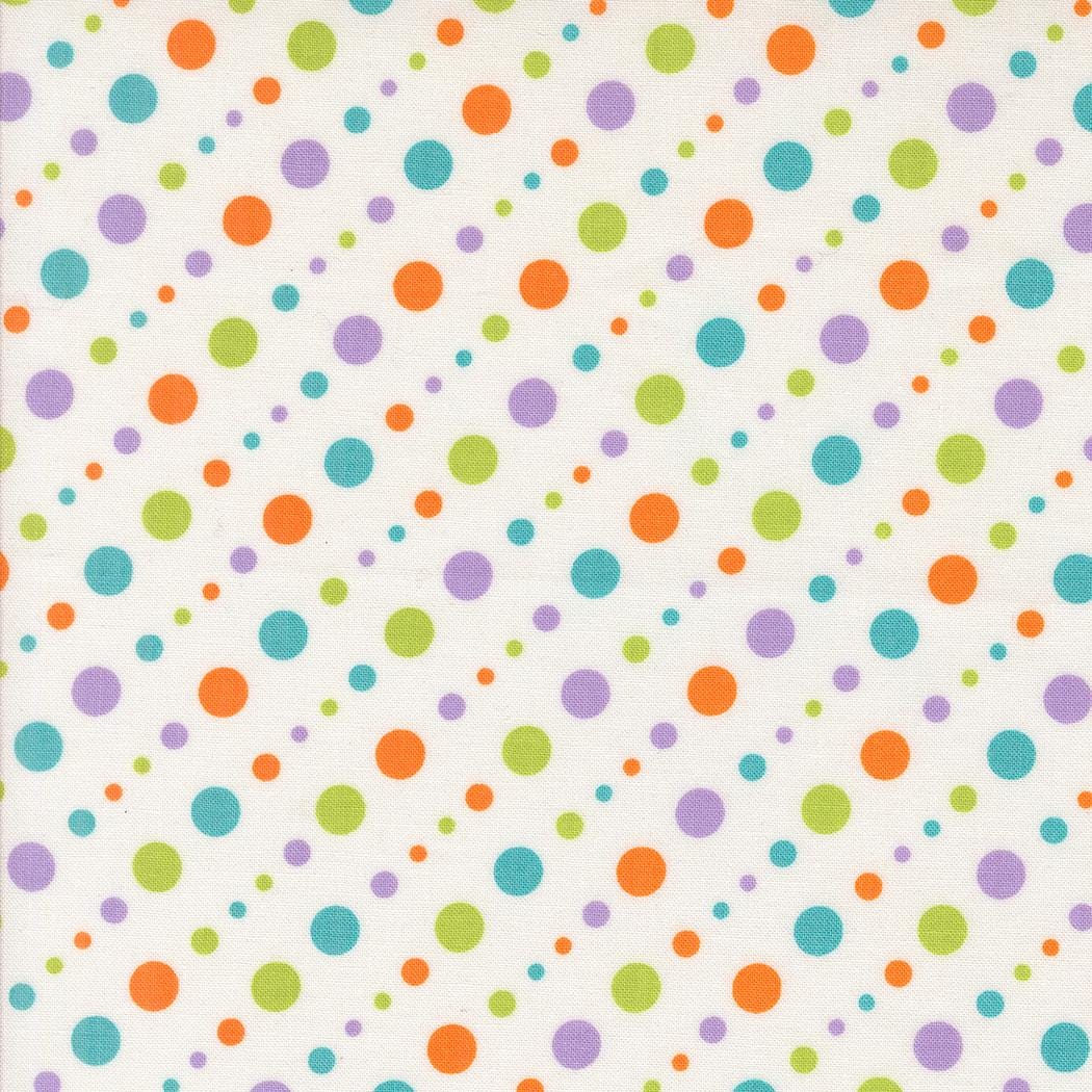 a pattern of multicolored polka dots on a white background.
