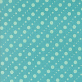a pattern of white polka dots on a light blue background.