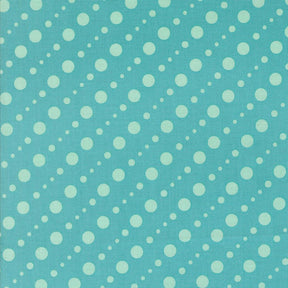 a pattern of white polka dots on a light blue background.