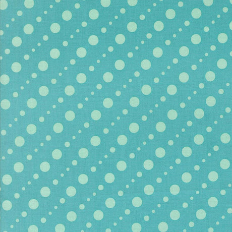 a pattern of white polka dots on a light blue background.