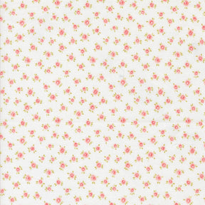 a repeating pattern of small pink flowers on a white background.