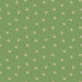 a repeating pattern of small white flowers against a green background.