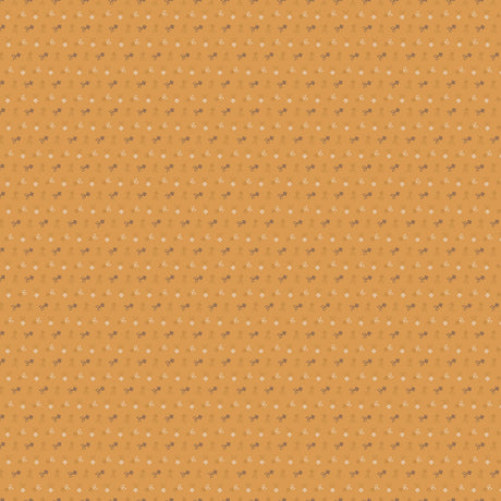 a repeating pattern of small white dots on a light orange background.