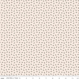 a repeating pattern of small black dots or shapes on a light beige background.