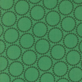 a repeating pattern of green circles on a green background.