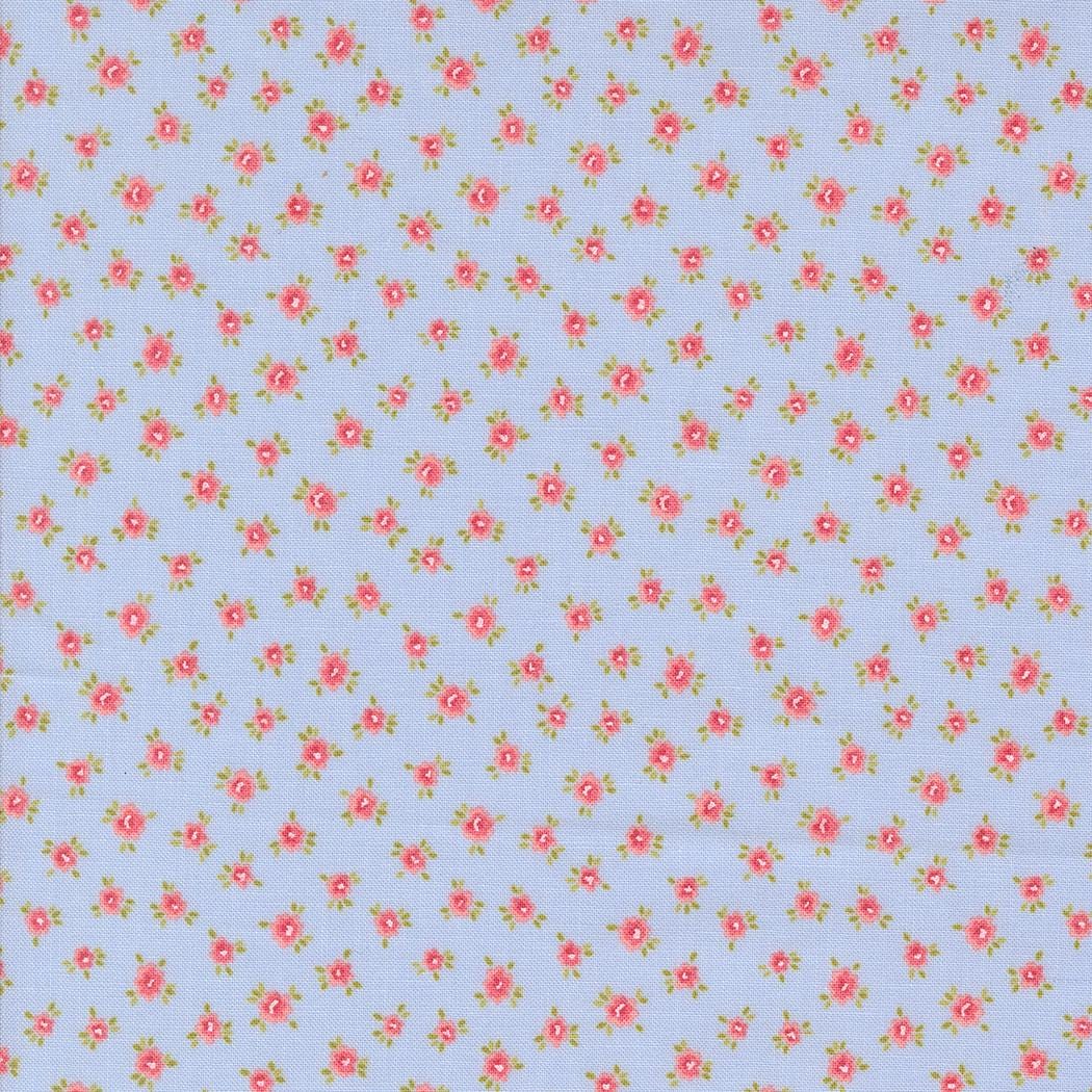 a pattern of small pink flowers on a light blue background.