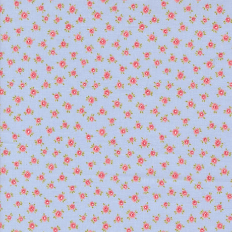 a pattern of small pink flowers on a light blue background.