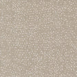 The image is a close-up of a textured fabric with small white dots or dots scattered across it, creating a speckled or speckled appearance.