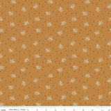 a repeating pattern of small white flowers against a brown background, creating a visually appealing and harmonious design.