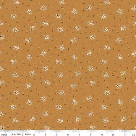 a repeating pattern of small white flowers against a brown background, creating a visually appealing and harmonious design.