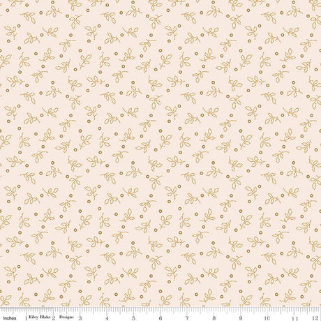 a repeating pattern of small orange leaves and dots on a light beige background.