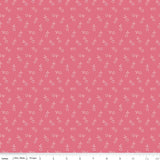 a repeating pattern of small white flowers or leaves against a pink background.