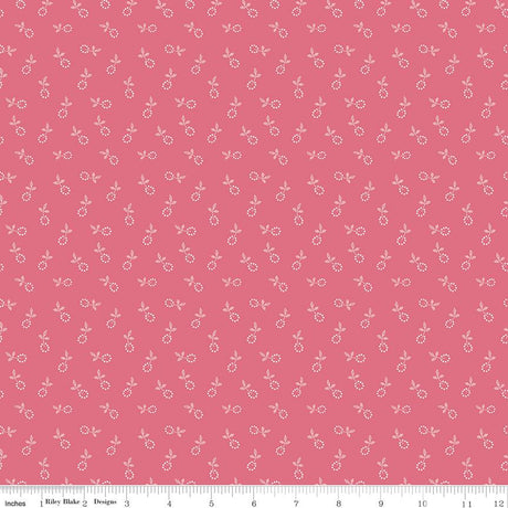 a repeating pattern of small white flowers or leaves against a pink background.