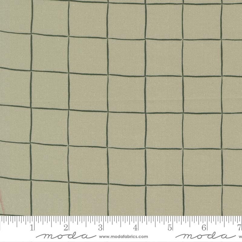 The image is a close-up of a fabric with a grid pattern of squares, measuring approximately 1.5 inches by 1.5 inches.