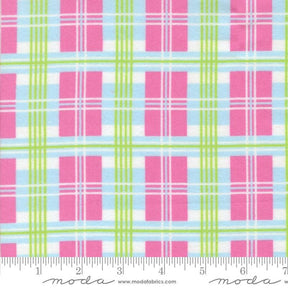 a fabric with a repeating pattern of pink and green plaid squares. The pattern is composed of vertical and horizontal stripes, creating a visually appealing and textured design. The fabric appears to be a soft, plush material suitable for clothing or home decor items.