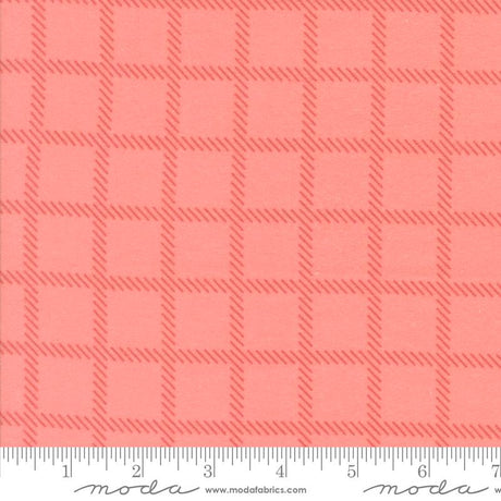 The image is a close-up of a fabric with a repeating pattern of red squares arranged in a grid-like fashion.