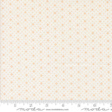 a fabric with a repeating pattern of small orange dots or stars on a light beige background. The fabric appears to be a fabric with a repeating pattern, possibly a fabric with a geometric or polka dot design. The image does not contain any text or other objects, and the focus is on the pattern and color of the fabric.
