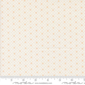 a fabric with a repeating pattern of small orange dots or stars on a light beige background. The fabric appears to be a fabric with a repeating pattern, possibly a fabric with a geometric or polka dot design. The image does not contain any text or other objects, and the focus is on the pattern and color of the fabric.