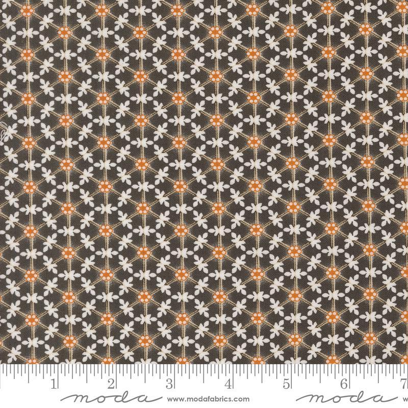 a repeating pattern of orange and white flowers on a dark background.